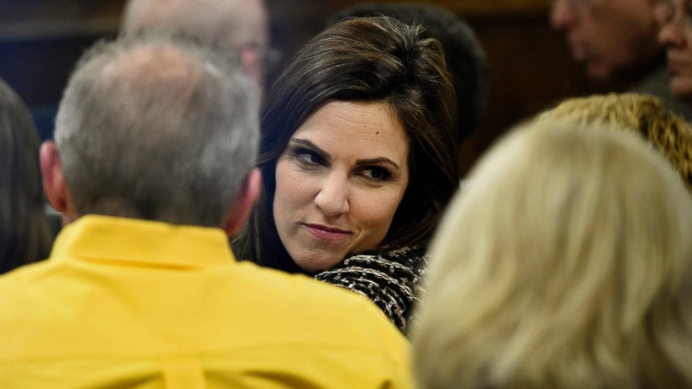 PHOTO: Taya Kyle, the widow of Chris Kyle, talks to others prior to proceedings in the capital murder trial of former Marine Cpl. Eddie Ray Routh in Stephenville, Texas on Feb. 24, 2015.