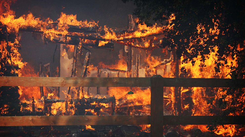 Multiple structures burn in the Poppet Flats area as the Silver Fire roared through the area along Hwy 243 between Banning and Idyllwild, Calif. on Wednesday, Aug. 7, 2013. (AP Photo/The Press-Enterprise, Frank Bellino)