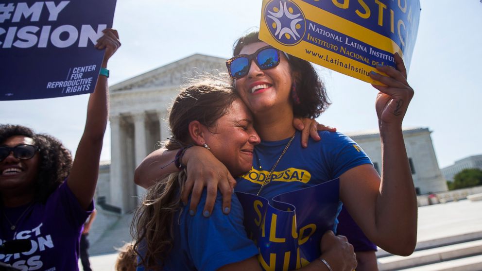 Two women hug as they celebrate during a rally at the Supreme Court in Washington, June 27, 2016, after the court struck down Texas' regulation of abortion clinics.