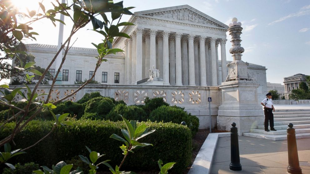 Security guards the Supreme Court in Washington, June 25, 2015. The court is expected to hand down decisions today.