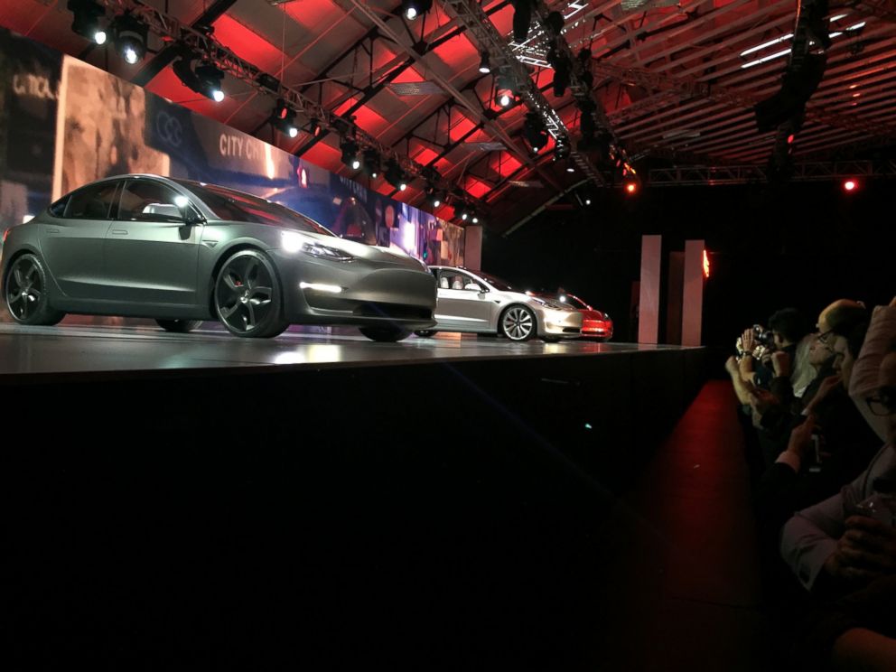 PHOTO: Tesla Motors unveils its Model 3 car at the Tesla Motors design studio Thursday, March 31, 2016, in Hawthorne, Calif. 