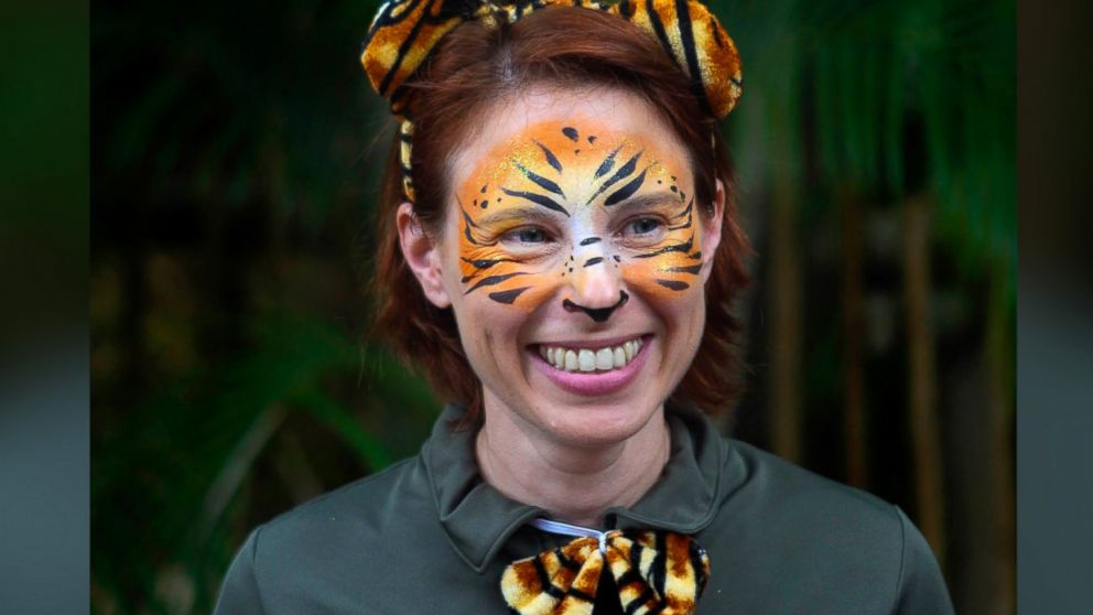 In this March 7, 2015 photo, Stacey Konwiser smiles during the dedication of the new tiger habitat at the Palm Beach Zoo in West Palm Beach, Fla.