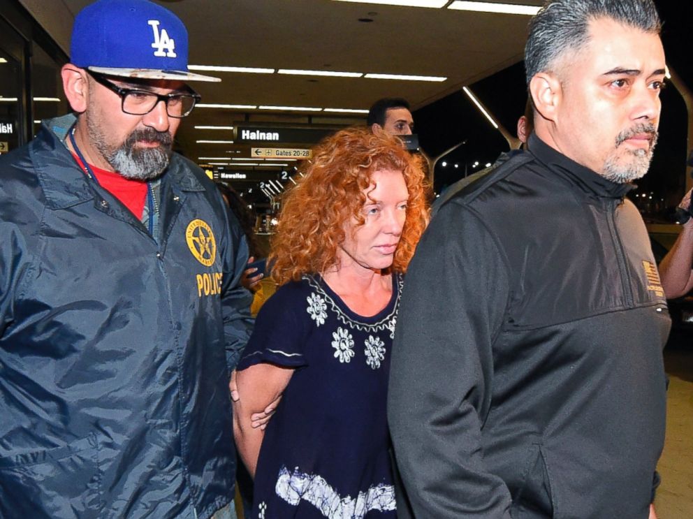 PHOTO: Tonya Couch is taken by authorities to a waiting car after arriving at Los Angeles International Airport, Dec. 31, 2015, in Los Angeles.