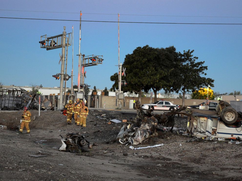 PHOTO: Firefighters arrive to attend to injured passengers at the scene of a Metrolink accident, Feb. 24, 2015, in Oxnard, Calif.