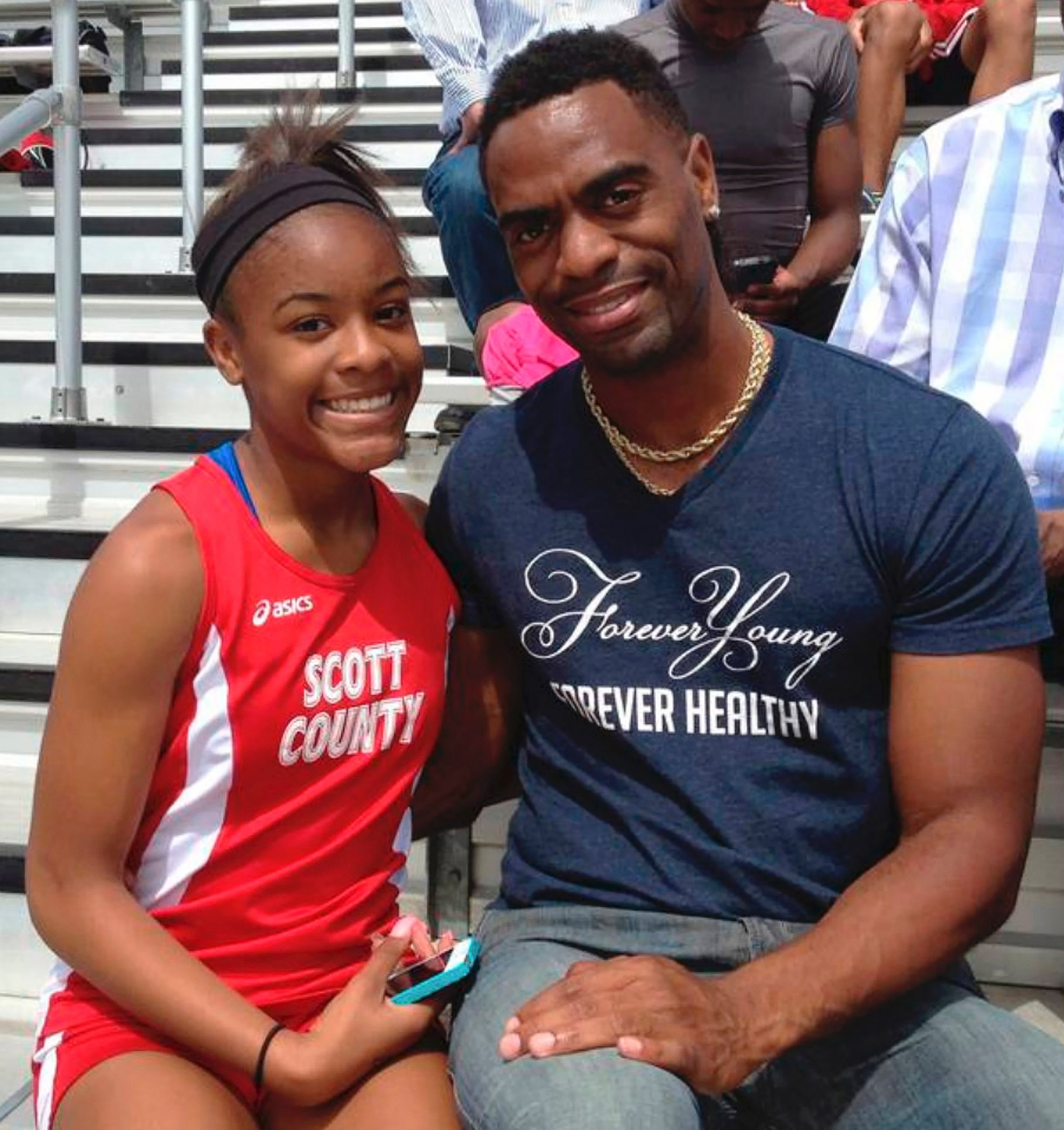 PHOTO: Trinity Gay poses for a photo with her father Tyson Gay.