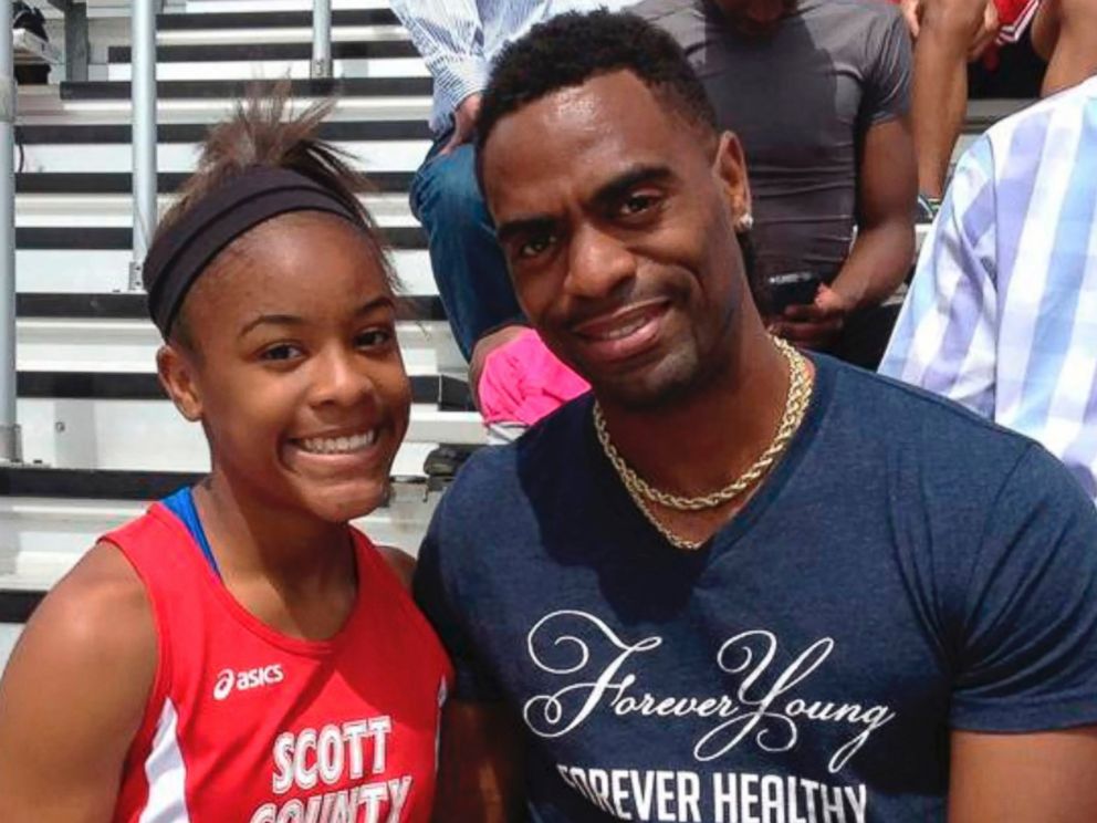 PHOTO: Trinity Gay poses for a photo with her father Tyson Gay.