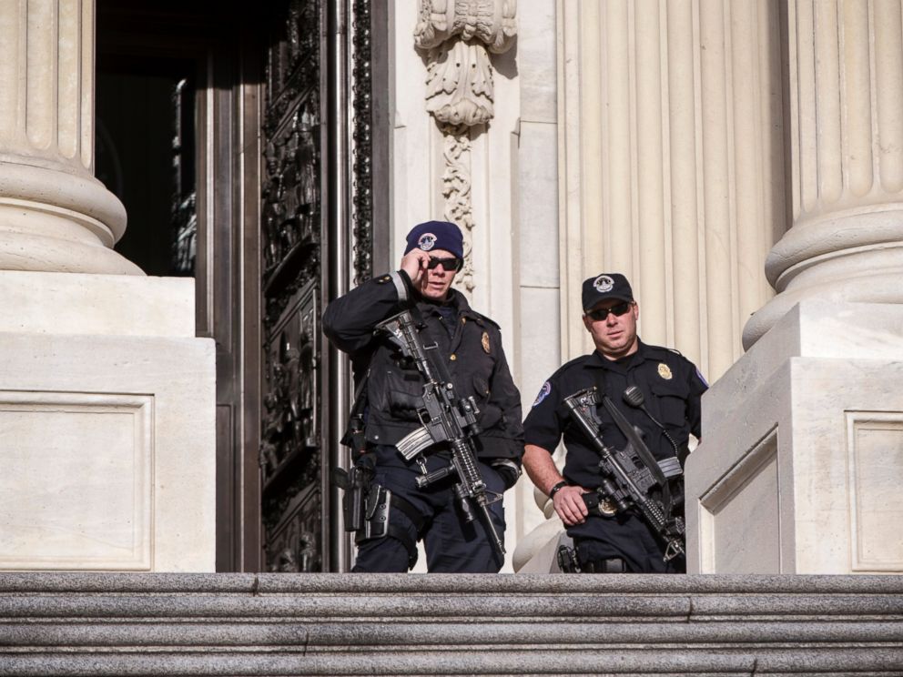 PHOTO: U.S. Capitol Police officers stand guard outside at the entrance to the House of Representatives on Capitol Hill in Washington, March 22, 2016.