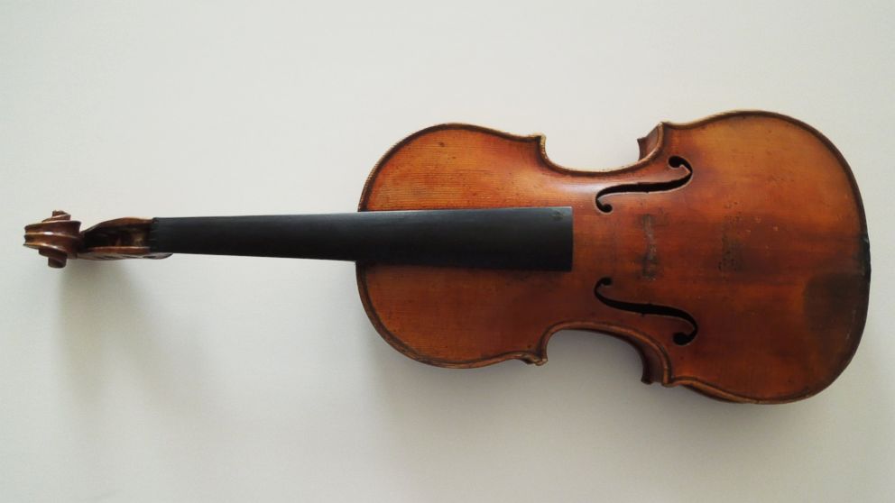 PHOTO: This handout photo provided by the FBI New York shows The Ames Stradivarius which was recovered by the FBI in June. 