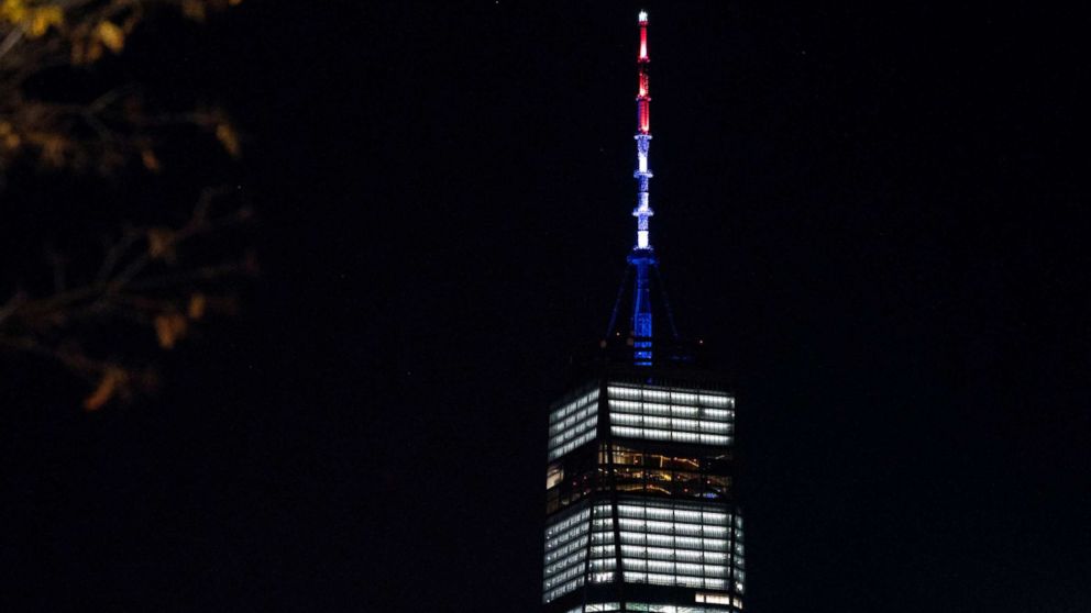 PHOTO: As ordered by New York Gov. Andrew Cuomo, the spire of One World Trade Center is illuminated in red, white and blue following a deadly rampage down a bike path not far from the building Tuesday, Oct. 31, 2017, in New York. 