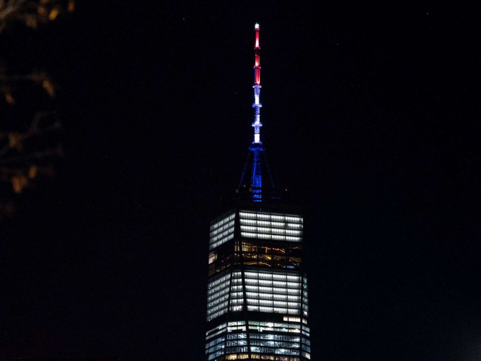 PHOTO: As ordered by New York Gov. Andrew Cuomo, the spire of One World Trade Center is illuminated in red, white and blue following a deadly rampage down a bike path not far from the building Tuesday, Oct. 31, 2017, in New York.