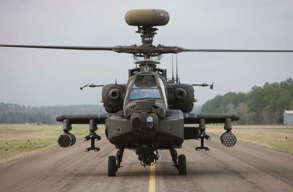 PHOTO: AH-64 Apache helicopter sits on the runway during flight operations in Conroe, Texas in this undated stock photo.