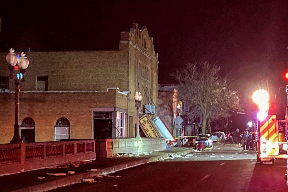 PHOTO: The fallen marquee is seen at the front entrance of the Apollo Theatre where a roof collapsed during a tornado in Belvidere, Ill., during a heavy metal concert, on March 31, 2023.
