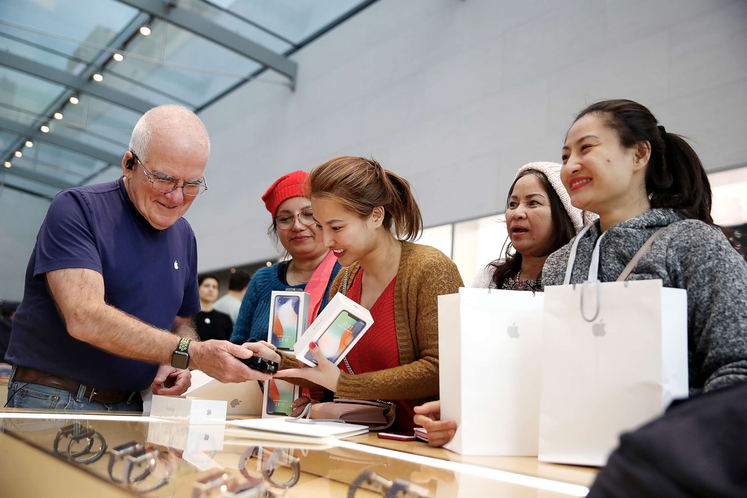 PHOTO: A customer purchases the new iPhone X at an Apple Store on Nov. 3, 2017, in Palo Alto, Calif. 