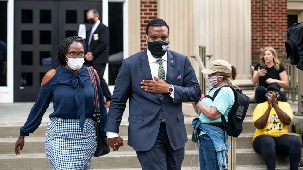 PHOTO: Wanda Cooper, mother of Ahmaud Arbery, and attorney Lee Merritt leave the Glynn County Courthouse on June 4, 2020 in Brunswick, Ga. Gregory and Travis McMichael are charged in the Feb. 23 fatal shooting of Arbery.