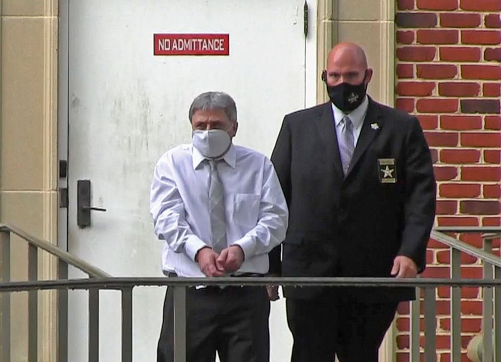 PHOTO: Roddy Bryant, accused in the shooting death of Ahmaud Arbery, is led by security officers from the Glynn County Courthouse in Brunswick, Ga., May 12, 2021, in this image from video. 