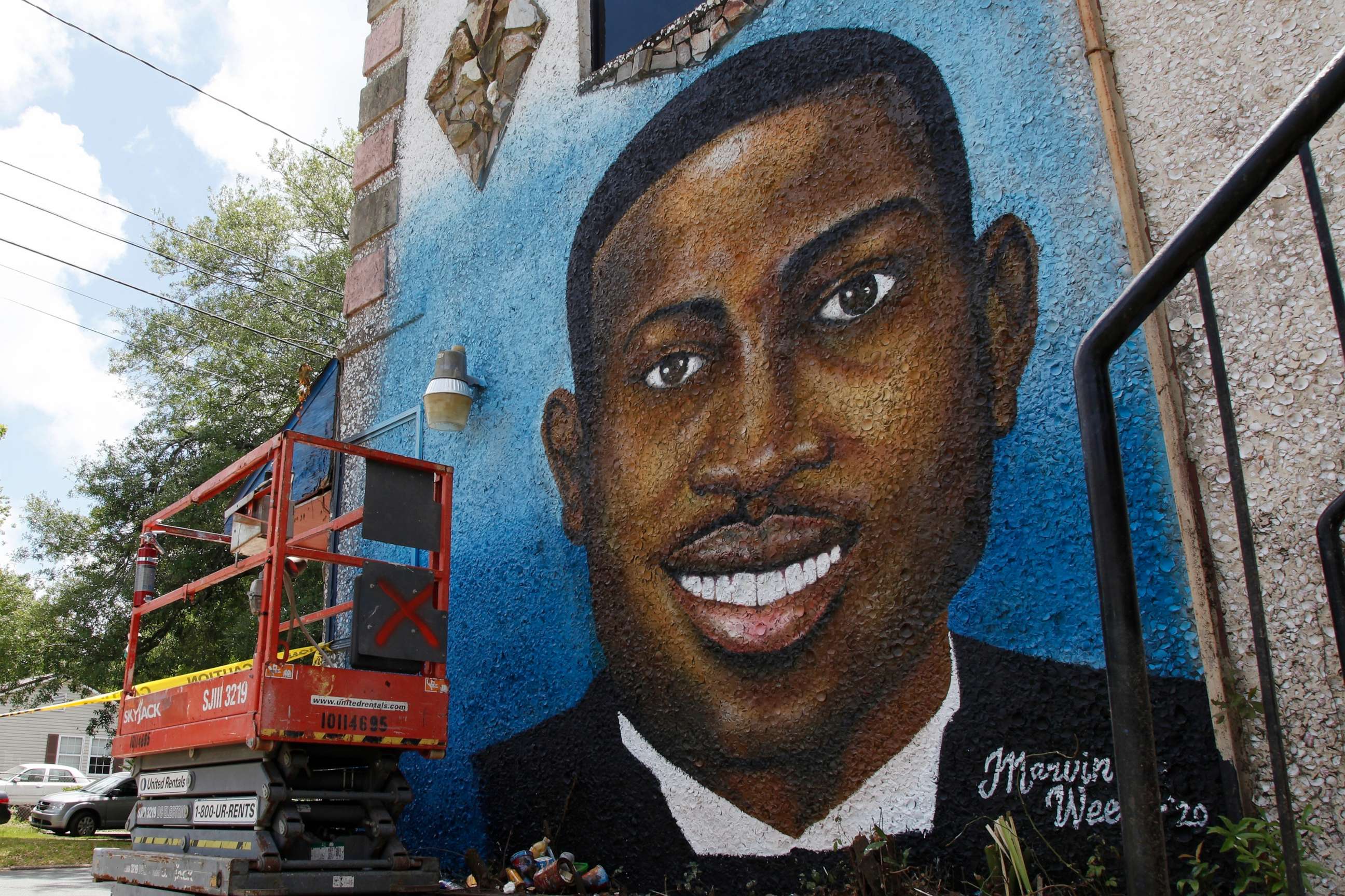 PHOTO: A painted mural of Ahmaud Arbery is displayed in Brunswick, Ga., May 17, 2020.