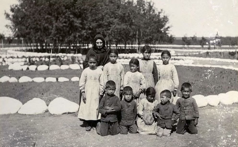 PHOTO: A historical photo from 1900 provided by the Provincial Archives of Saskatchewan shows a Roman Catholic nun with students at the St. Michael's Indian Residential School in Duck Lake, Northwest Territories, now Saskatchewan, Canada.