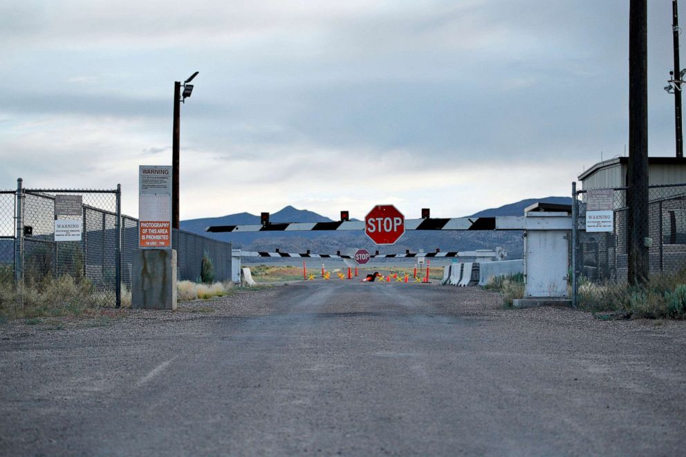 PHOTO: Signs warn about trespassing at an entrance to the Nevada Test and Training Range near Area 51 outside of Rachel, Nev.