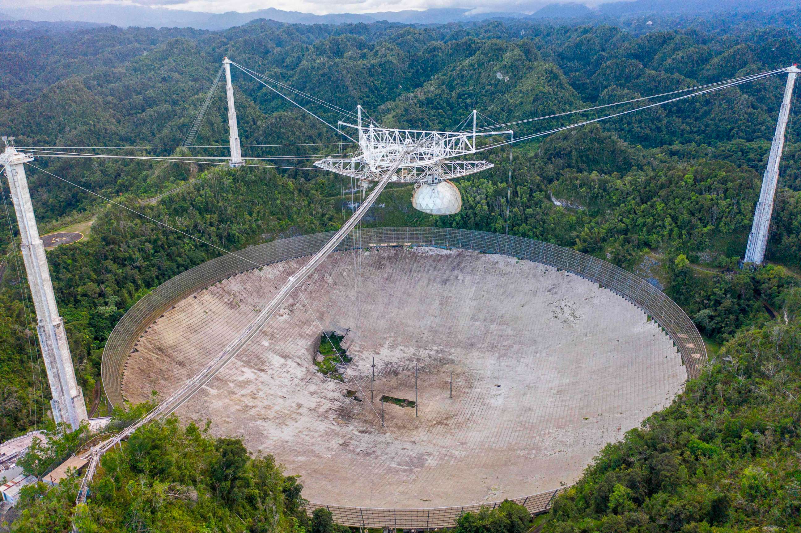 PHOTO: This aerial view shows a hole in the dish panels of the Arecibo Observatory in Arecibo, Puerto Rico, on Nov. 19, 2020.