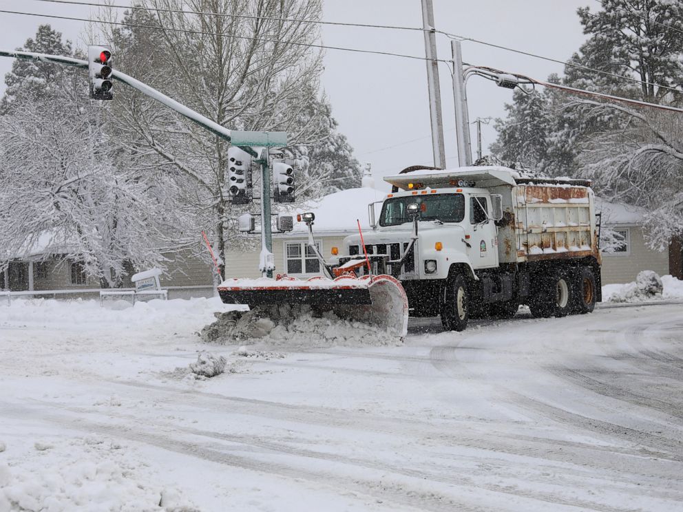 PHOTO: A city snowplow helps clear roads north of downtown Flagstaff, Ariz., Friday, Nov. 29, 2019.