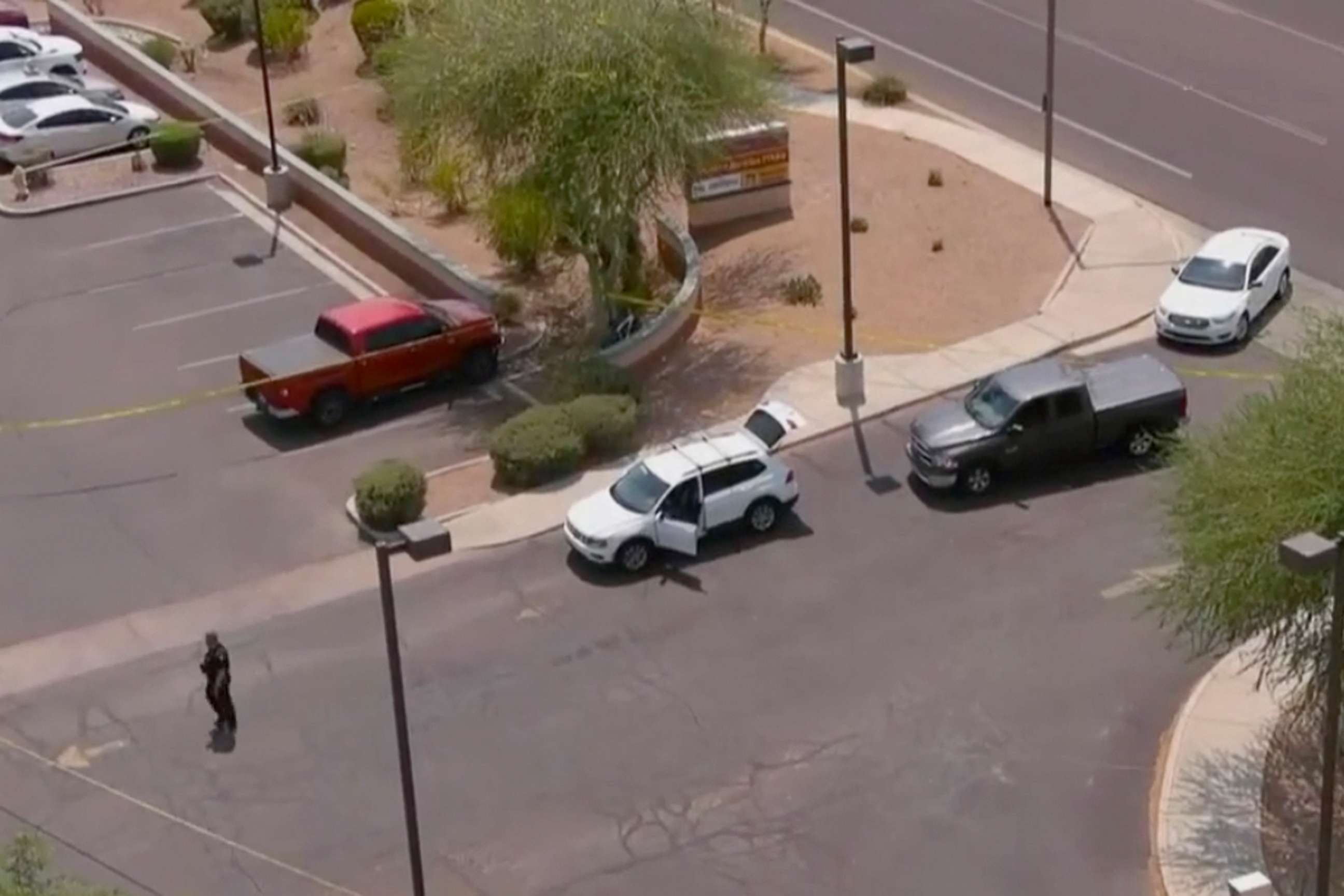 PHOTO: In this still image from drone video courtesy of Arizona's Family, is the the scene where a suspect was taken into custody in a white SUV following multiple shootings in Surprise, Ariz., on Friday, June 18, 2021. 
