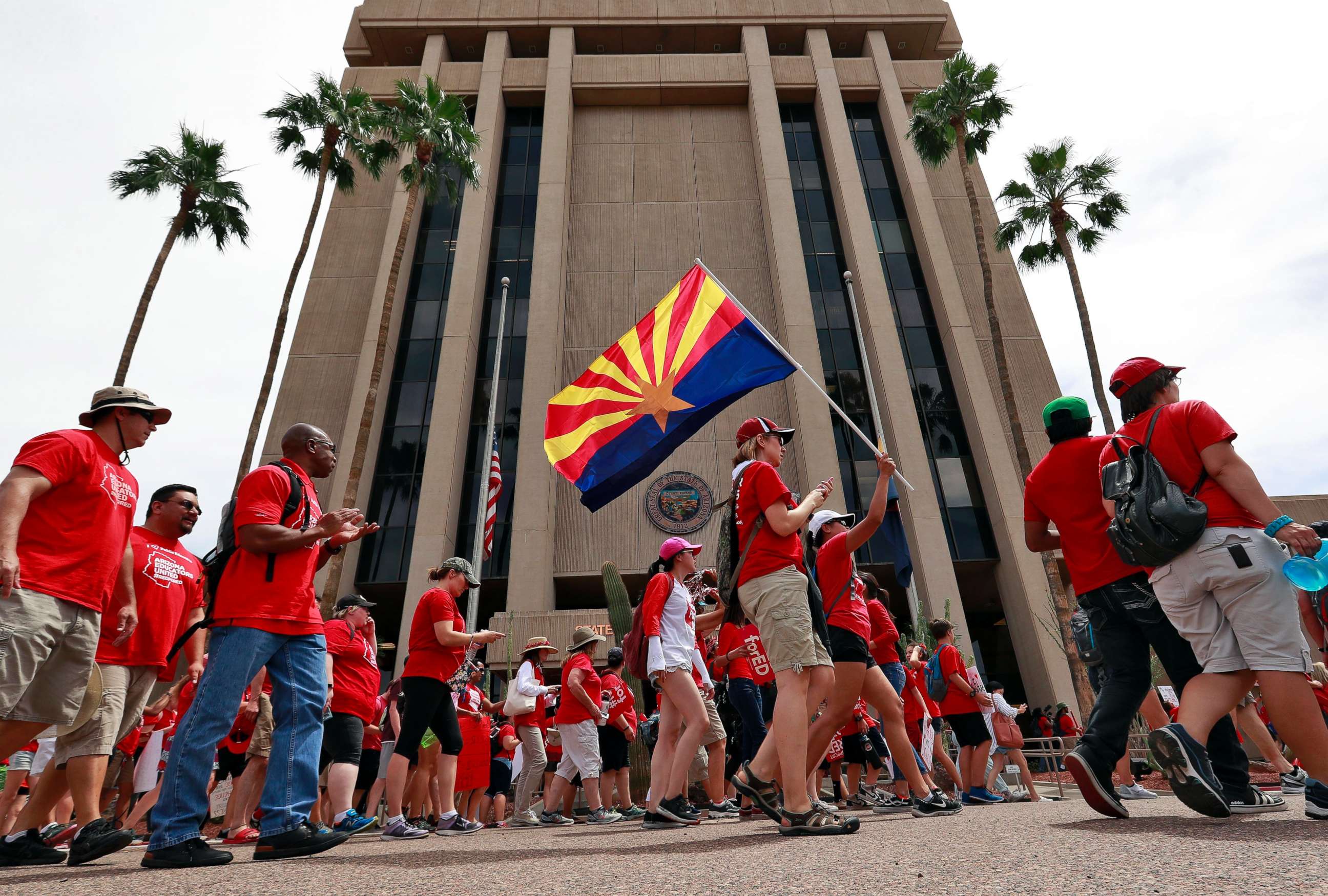 PHOTO: Teachers rally outside of Arizona Gov. Doug Ducey's Executive Tower Monday, April 30, 2018, in Phoenix on their third day of walk outs.