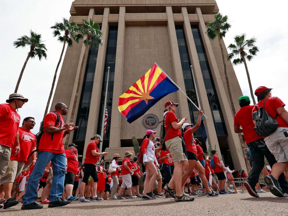 PHOTO: Teachers rally outside of Arizona Gov. Doug Duceys Executive Tower Monday, April 30, 2018, in Phoenix on their third day of walk outs.