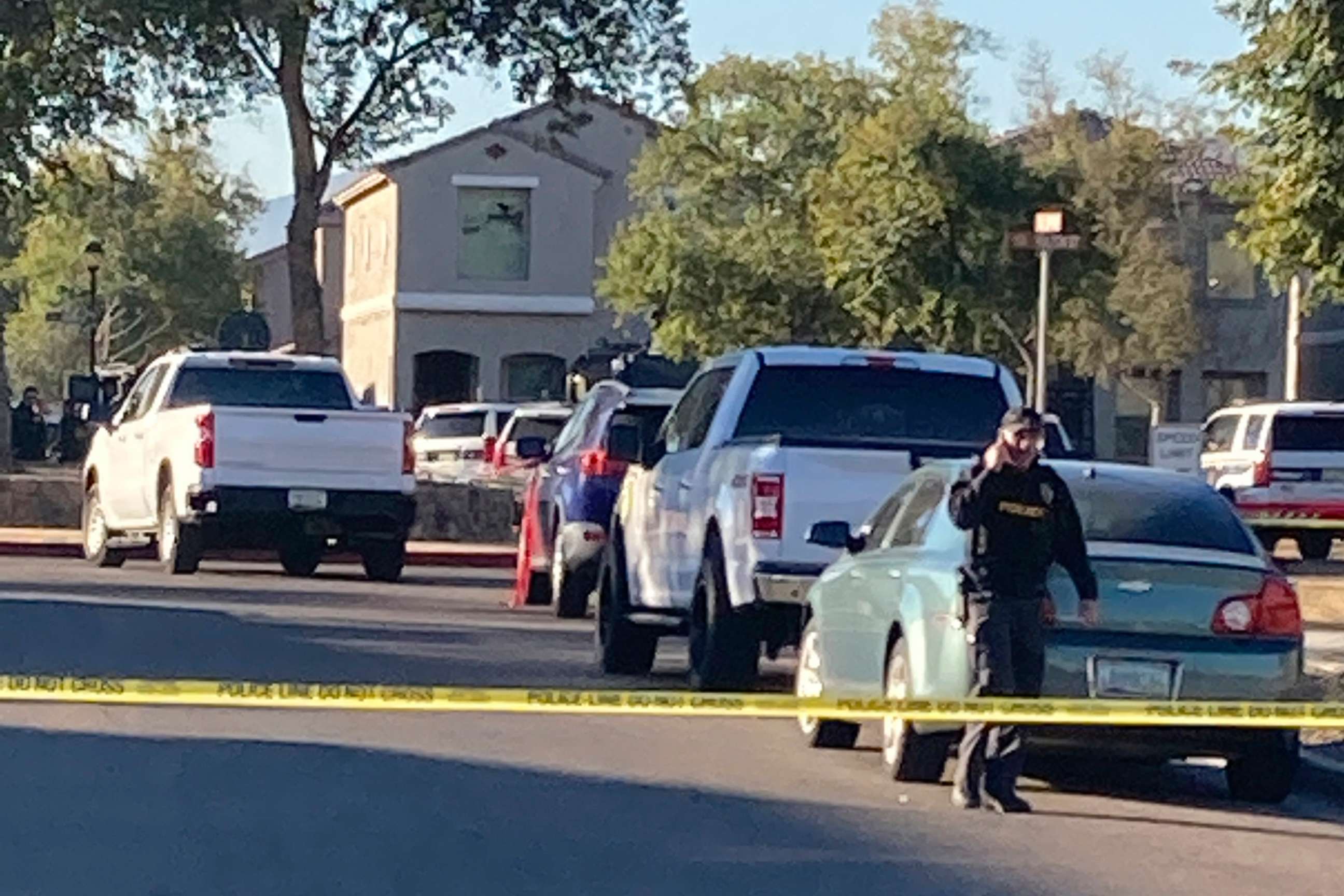 PHOTO: The scene near where five Phoenix police officers were shot and wounded after responding to a report of gunfire inside a home, Feb. 11, 2022.