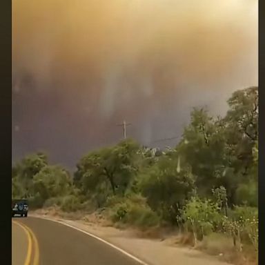 Thick smoke from the Bighorn Fire blankets the Arizona sky as a wildfire near Tucson scorches nearly 23,000 acres.