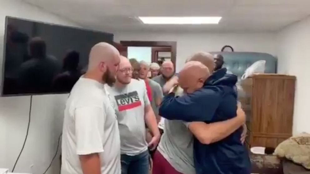 PHOTO: Member of the Lyons College football squad shaved their heads in support of the team's offensive coordinator, Kris Sweet, who was recently diagnosed with cancer.