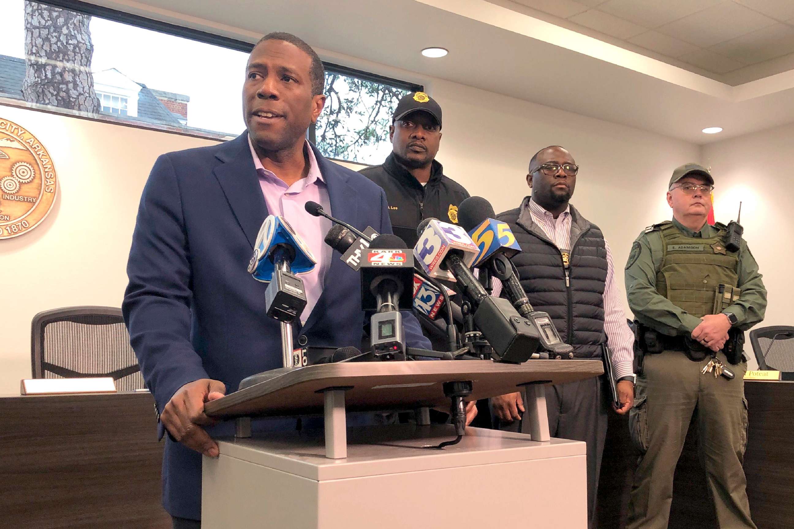 PHOTO: Forrest City, Ark., Mayor Cedric Williams, left, holds a news conference after two police officers were wounded and a gunman was killed in an exchange of gunfire at a Walmart store in eastern Arkansas, Feb. 10, 2020.