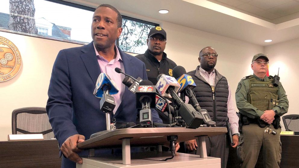 PHOTO: Forrest City, Ark., Mayor Cedric Williams, left, holds a news conference after two police officers were wounded and a gunman was killed in an exchange of gunfire at a Walmart store in eastern Arkansas, Feb. 10, 2020.
