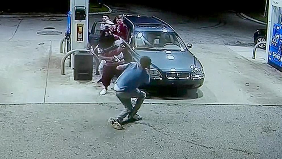PHOTO: The victims were pumping gas when an armed robber approached them and demanded everything they had.