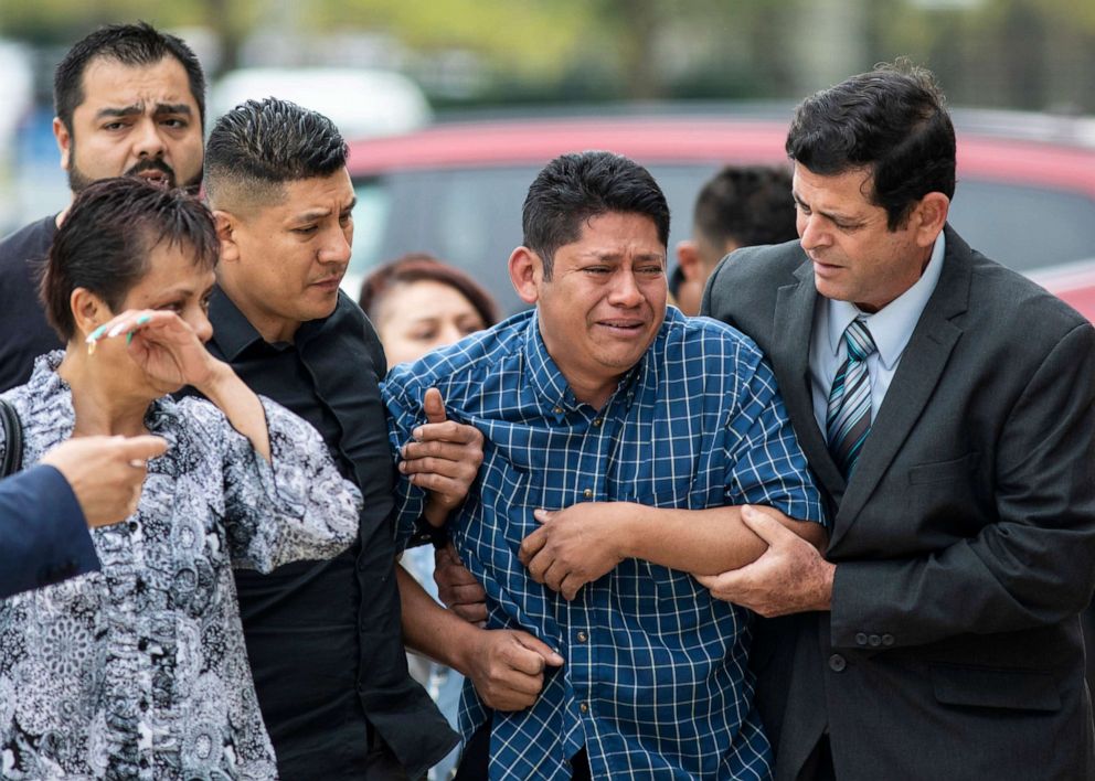 PHOTO: Arnulfo Ochoa, Marlen's father Ochoa-Lopez, is surrounded by family members and supporters, while he goes to the Cook County Medical Examiner's office to identify his daughter's body, the May 16, 2019 in Chicago.