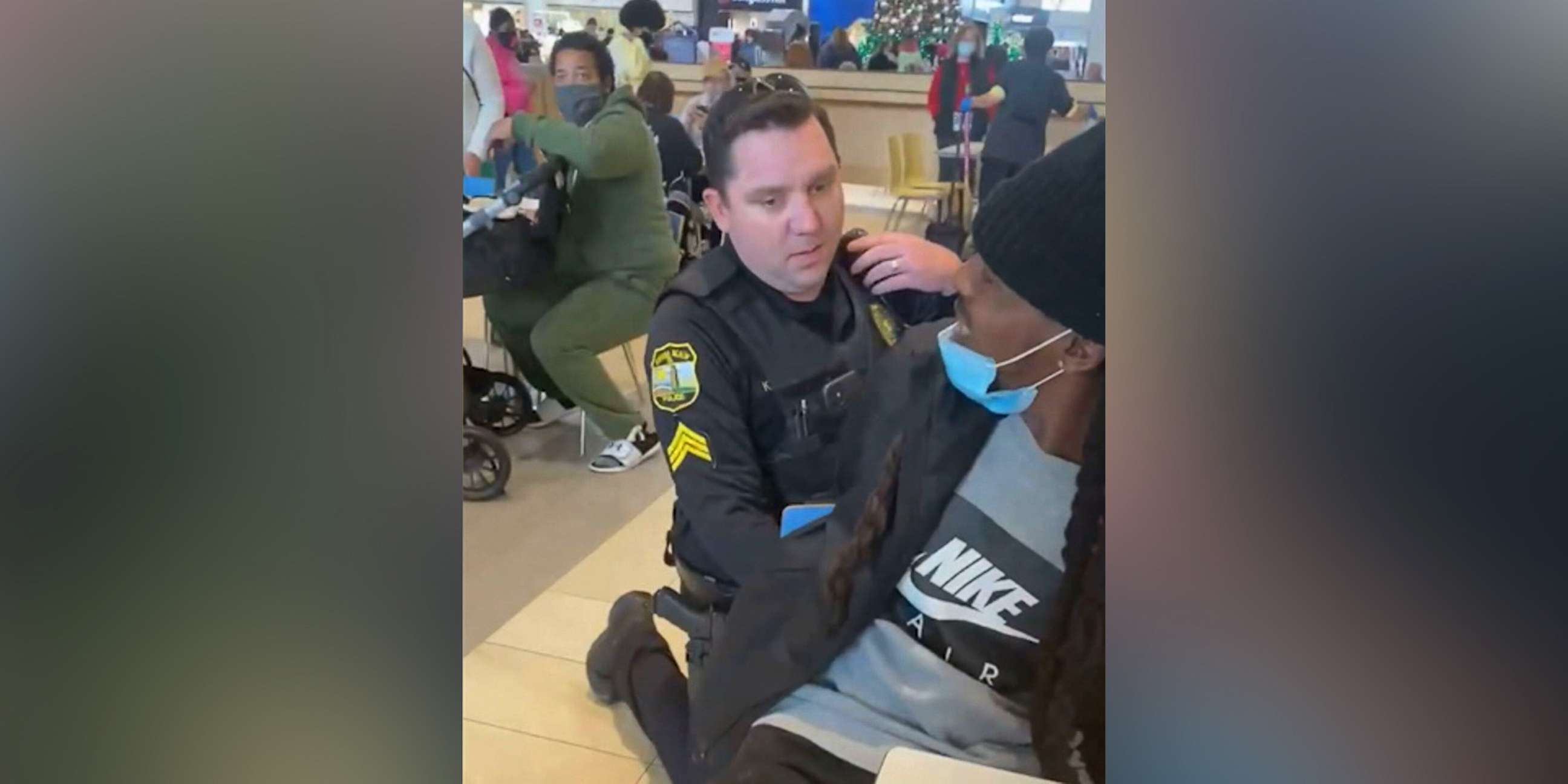 PHOTO: Jamar Mackey is put in handcuffs while eating with his fiancee and their 13-year-old son in the food court at a shopping mall in Virginia Beach, Va., Dec. 19, 2020, after he was mistaken for a suspect in a credit card theft.