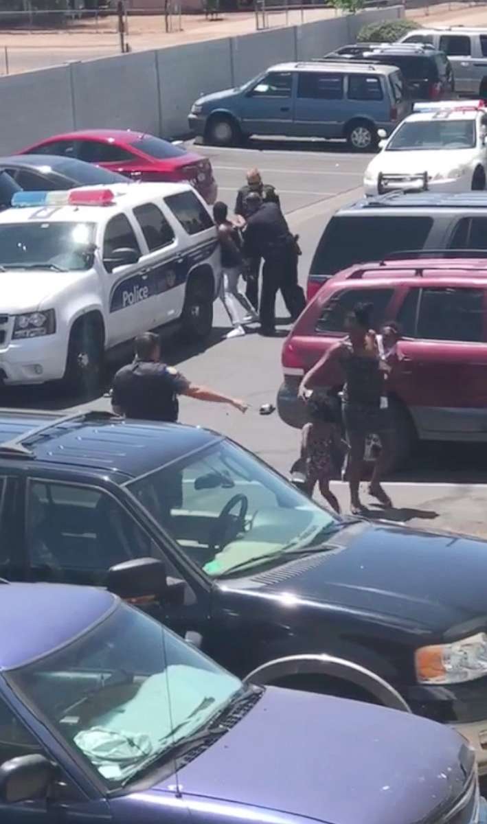 PHOTO: Cell phone video shows officers from the Phoenix Police Department sweep-kicking handcuffed Dravon Ames, May 27, 2019.