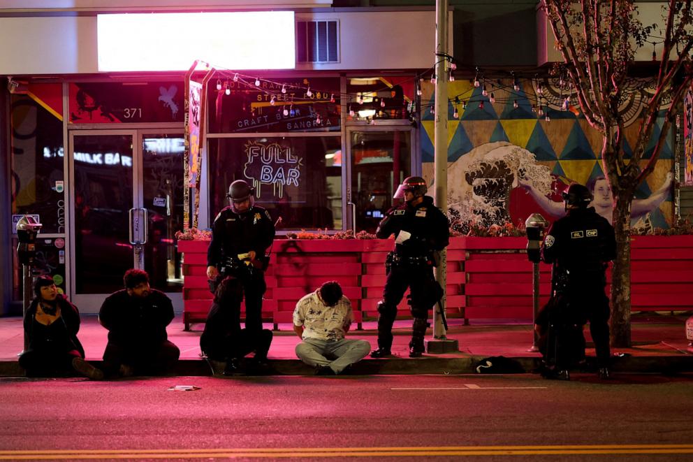 PHOTO: Members of law enforcement detain people as protests against federal immigration sweeps continue, in downtown Los Angeles, California, U.S. June 9, 2025.
