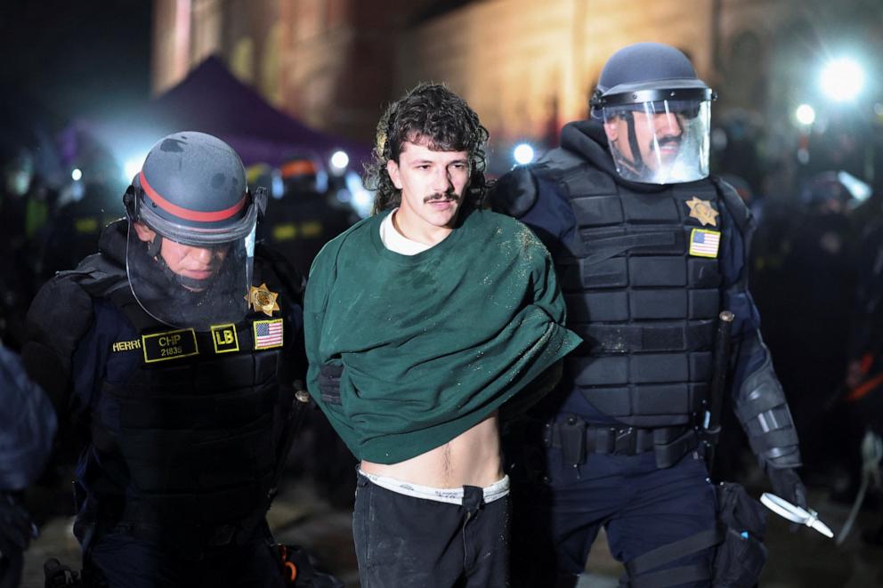 PHOTO: Law enforcement officers detain a protester at the University of California Los Angeles in Los Angeles, California, U.S., May 2, 2024.