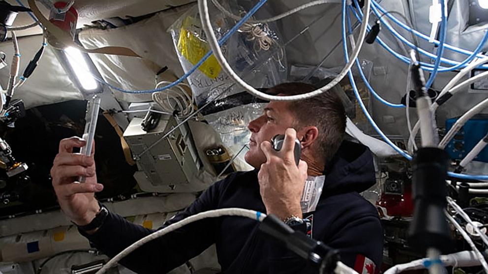 PHOTO: CSA astronaut Jeremy Hansen shaves after waking up on the Orion spacecraft, April 6, 2026.