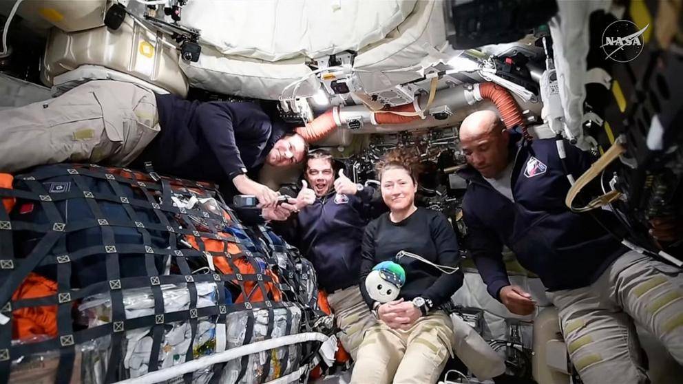PHOTO: CSA astronaut Jeremy Hansen and NASA astronauts Reid Wiseman, Christina Koch, Victor Glover speak with ABC News from the Orion spacecraft as it heads to the moon, April 2, 2026.