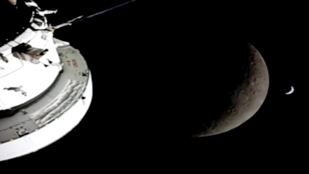 PHOTO: A crescent shaped Earth is seen behind the Moon as seen just before the Orion spacecraft flew on the back side of the Moon, April 6, 2026.