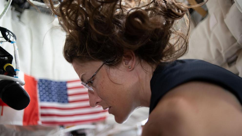 PHOTO: NASA astronaut and Artemis II mission specialist Christina Koch, seen here on the fourth day of the mission, prepping for lunar flyby activities after completing aerobic exercise on the flywheel device, April 5, 2026.