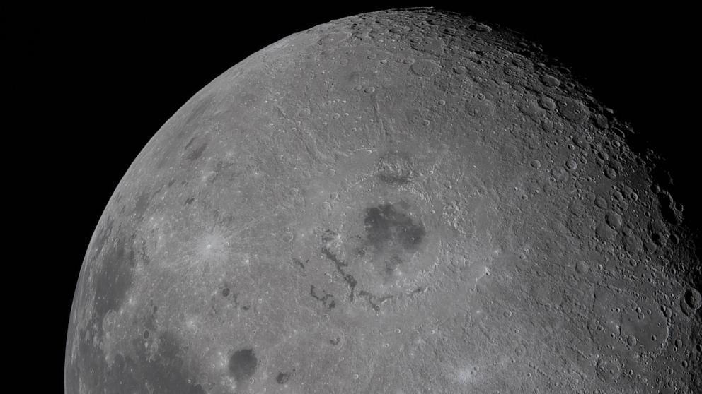 PHOTO: Orientale basin is visible in the center, with a black patch of ancient lava in the center that punched through the Moon's crust in an eruption billions of years ago, in this view of the Moon, taken by the Artemis II crew, April 6, 2026.