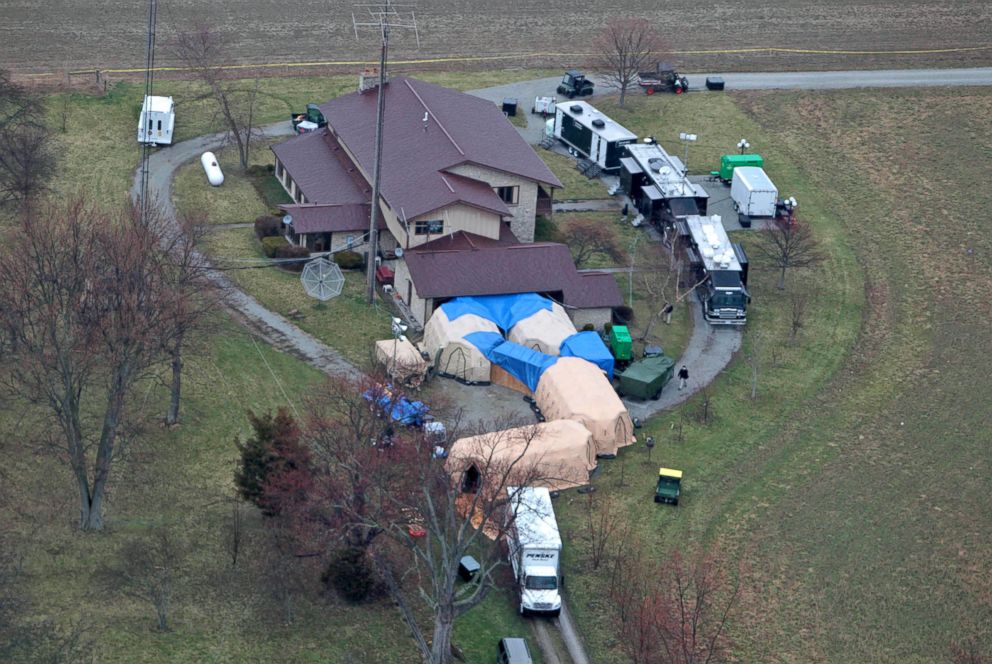 PHOTO: FBI agents work at the home in Waldron, Ind., confiscating artifacts, April 2, 2014.