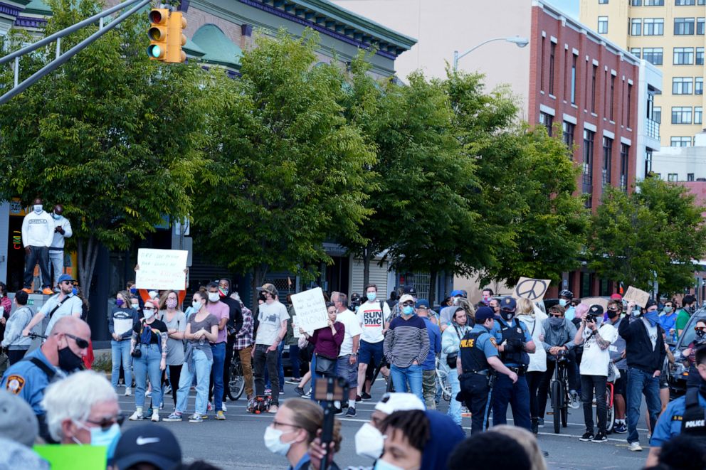 PHOTO: Protesters holding signs and listening to a speaker at the June 1st rally in Asbury Park.