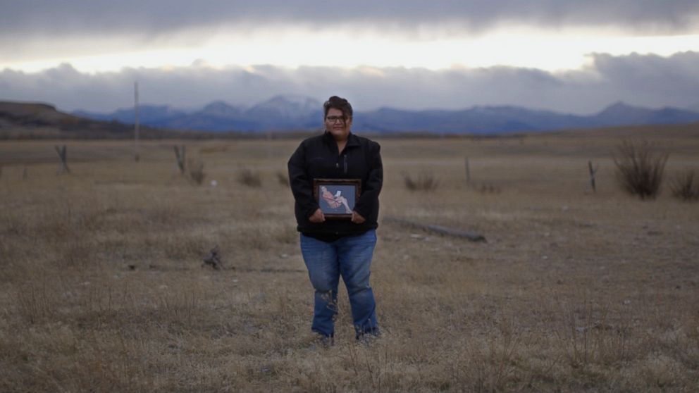 PHOTO: Kimberly Loring holds a portrait of her younger sister Ashley Loring HeavyRunner, who has been missing for more than four months.