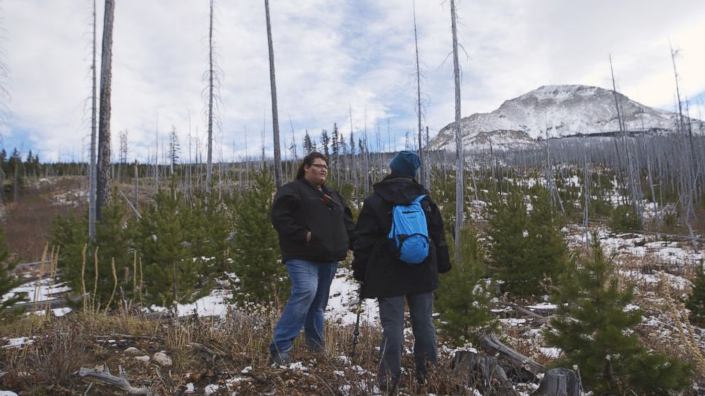 PHOTO: Kimberly Loring and a volunteer stop to catch their breath while searching for Ashley Loring HeavyRunner in the Rocky Mountains.