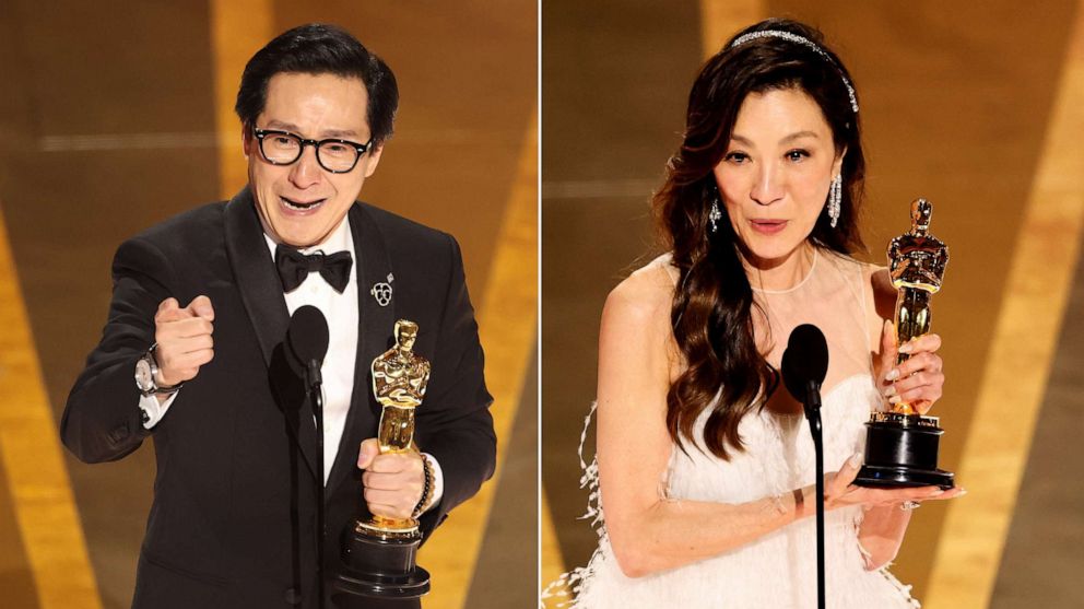 PHOTO: Ke Huy Quan and Michelle Yeoh accept their Oscars at the 95th Annual Academy Awards in Los Angeles, Mar. 12, 2023.