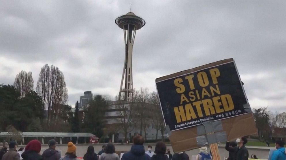 PHOTO: Crowds gather near the Space Needle to protest ant-Asian hate in Seattle, March 27, 2021.