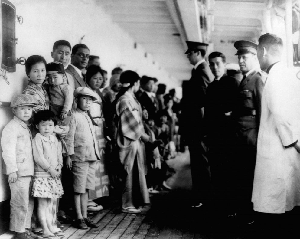 PHOTO: Immigration officials examine Japanese immigrants aboard the ship Shimyo Maru, in Angel Island, Calif, 1931.